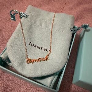 Tiffany & Co. 18kt rose gold Amour necklace from the graffiti collection.